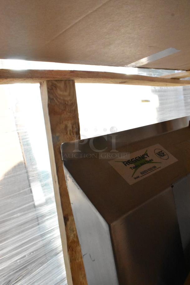 Regency 600S3162018R stainless steel 3 bay sink, scratch and dent, no legs, right side drain board, NSF label visible.