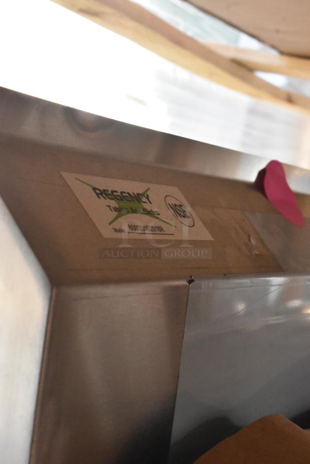 Stainless steel Regency 600S3162018R commercial sink, 3 bays, right-side drain board, scratch and dent condition, no legs.