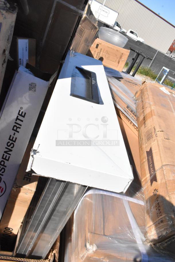 15 new "scratch and dent" items including Steelton wire shelf kits and Regency stainless steel wall shelves, boxed.