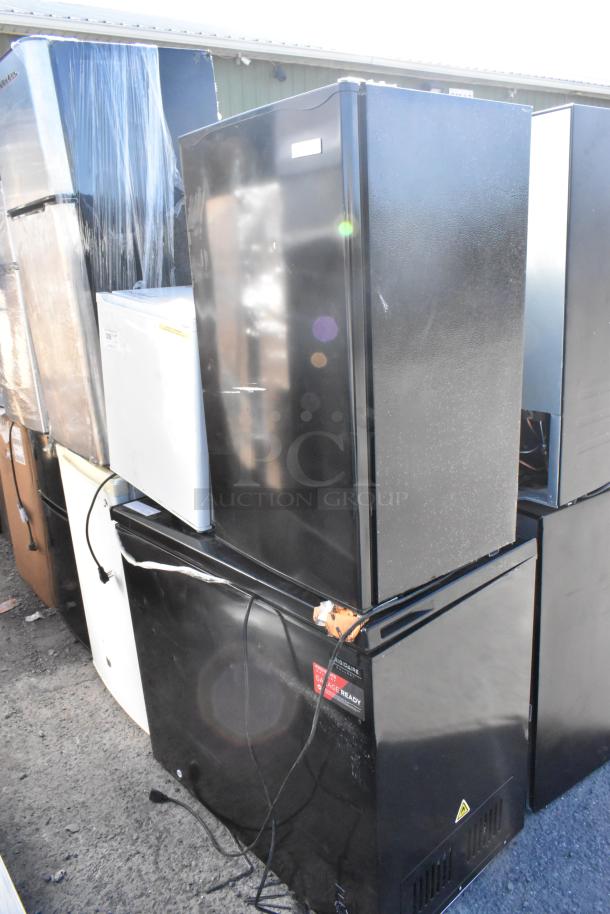 Three mini coolers including Nostalgia IRF32BK, Haier HSA02WNDWW, 115V, 1 phase, assorted colors, visible wear.