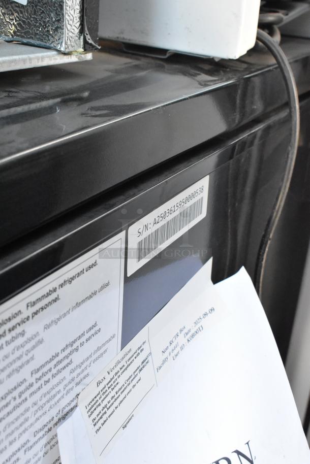 Three mini coolers, including Nostalgia IRF32BK, visible labels with serial number A2503615950000538, Haier HSA02WNDWW.