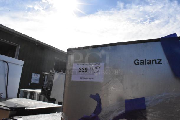 Three mini coolers, including Nostalgia IRF32BK and Haier HSA02WNDWW, 115 volts, 1 phase. Visible label: PCI Auctions, lot 339.