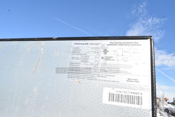 Various mini coolers including Nostalgia IRF32BK and Haier HSA02WNDWW, 115 volts, 1 phase. Visible label with specifications.