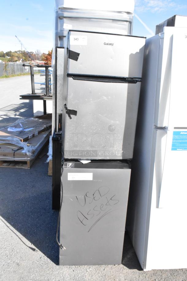 Two used coolers: Galanz GLR31TS1E02 and Hisense mini cooler. Both 115 volts, 1 phase. Marked "Used Assets."