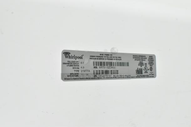 Label showing Whirlpool WRT511SZDW00 model, 115V, 1 Phase, full load amp 6.5, refrigerant R-134a, serial VS44776127.