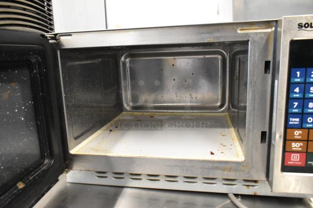 2022 Solwave 180MW112T stainless steel commercial microwave, interior view, moderate wear, 120 volts, 1 phase power.