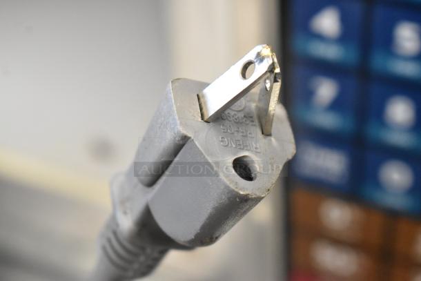 Close-up of a power plug for a Solwave 180MW112T Stainless Steel Commercial Microwave Oven, 120V, 1 phase.