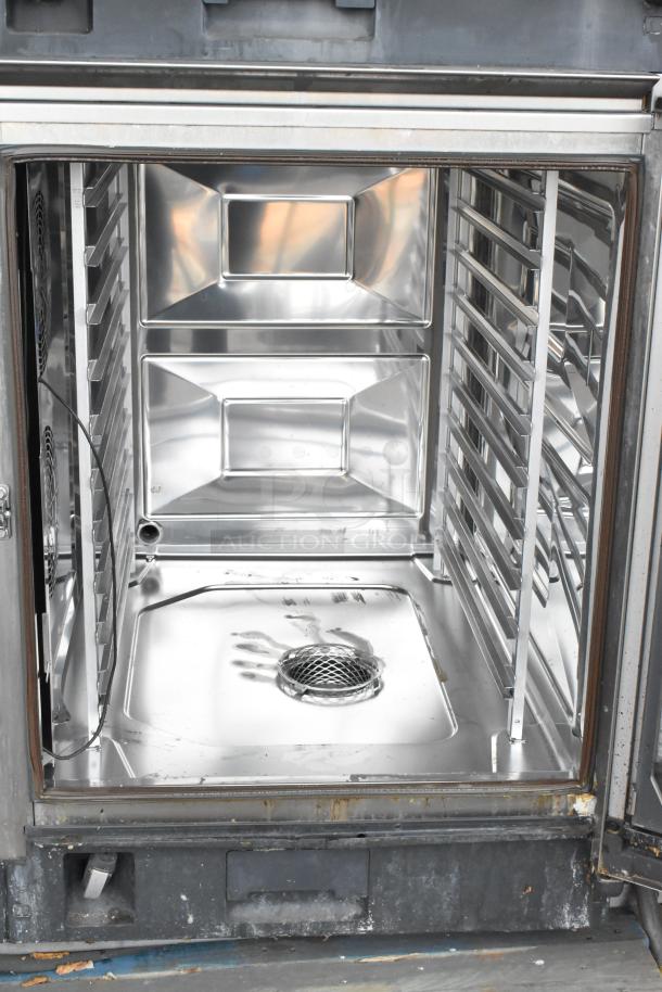 Rational iCombiPro convection oven interior, stainless steel, multiple racks, commercial use, 2021 model.
