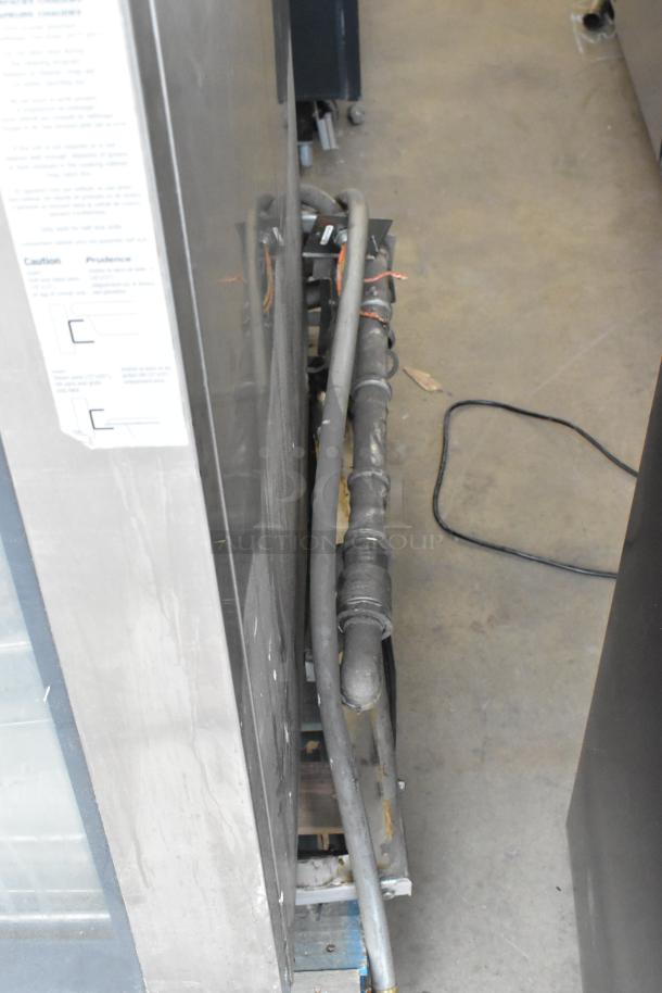 Two 2021 Rational iCombiPro convection ovens, stainless steel, electric, 440/480V, 3-phase. Appears in good condition.