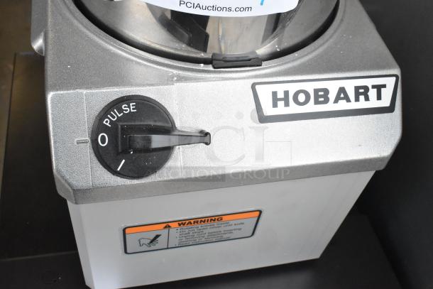 Brand new 2024 Hobart FP41 commercial food processor, silver, scratch and dent, pulse setting, 120V, 1 phase, warning label visible.