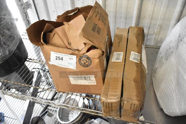 Three new scratch and dent items, including two TBH-18/23299 models and commercial casters. Bid for three times the value. Box shows PCI Auctions label and ID #254.