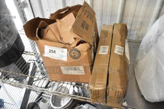 Three new scratch and dent items, including two TBH-18/23299 models and commercial casters. Bid for three times the value. Box shows PCI Auctions label and ID #254.