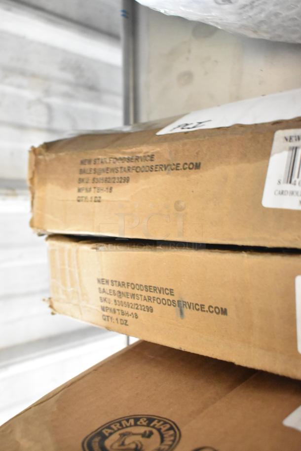 Cardboard boxes labeled New Star Foodservice with SKU 350592/23299 and model TBH-18, showing light wear.