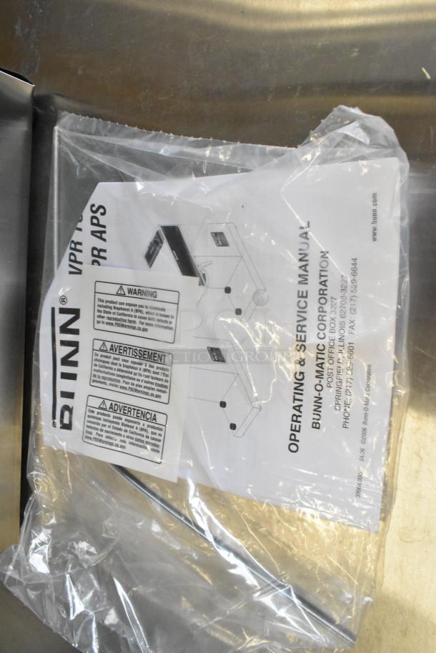 BRAND NEW 2025 Bunn VPR-APS Pourover Airpot Coffee Brewer, 120V, 1 Phase. Manual in packaging with warnings visible.