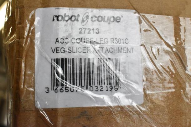 Brand new Robot Coupe 27213 veg-slicer attachment, in original packaging with visible barcoded label, minor box wear.