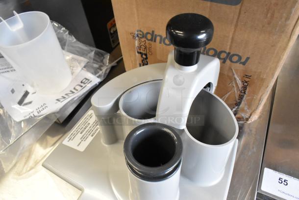 Brand new Robot Coupe 27213 scratch and dent model, featuring durable construction, shown with original packaging.