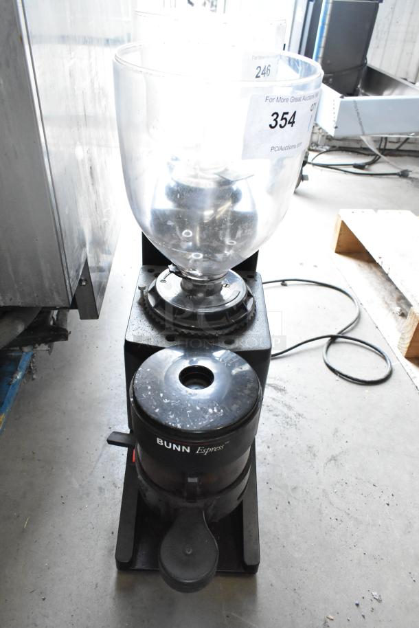 Bunn ES-1G metal countertop espresso bean grinder, missing lid, 120 Volts, 1 phase, in used condition with visible wear.