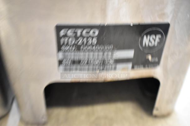 Stainless steel Fetco ITD-2135 beverage dispensers, new scratch and dent, NSF certified label visible.