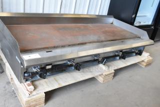 Avantco Chef Series CAG-60-TG 60" gas griddle with thermostatic controls, 175,000 BTU, used condition, on pallet.
