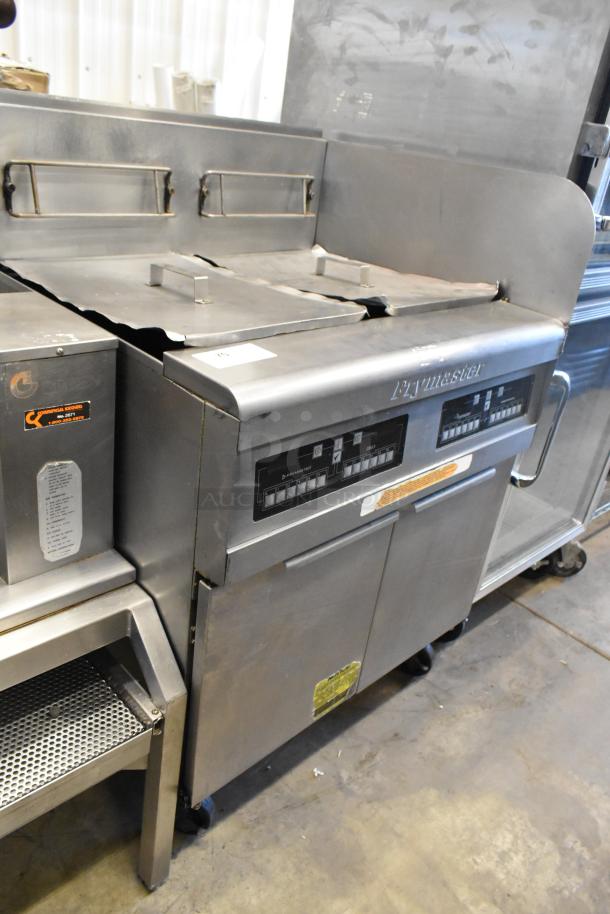 Frymaster PH255SC commercial stainless steel deep fryer, natural gas, 80,000 BTU, on casters, used condition, model label visible.