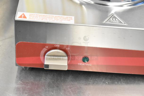 Brand new Avantco 177EB202SBSM double burner hot plate. Stainless steel, 240V, 1 phase. Control dial and heating indicator visible.