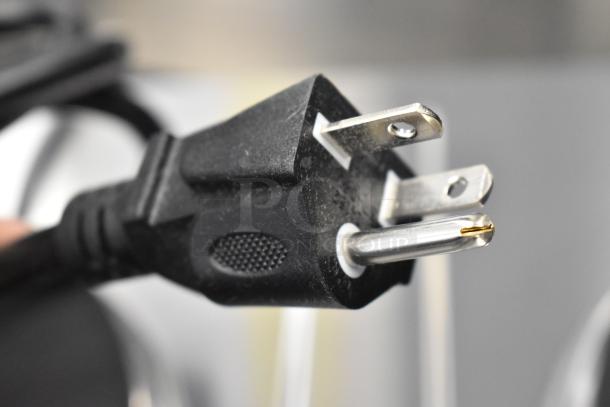 Close-up of a three-prong black plug for the Avantco 177EB202SBSM double burner hot plate.