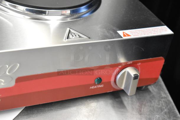 Brand new Avantco double burner, stainless steel electric hot plate. Features heating indicator and control knob. Model 177EB202SBSM.
