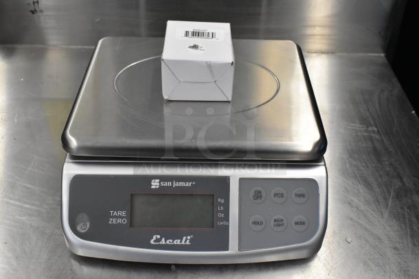 San Jamar / Escali SCDGM33 33 lb. digital kitchen scale with box on stainless steel platform; new condition.