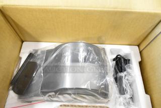 Brand new AvaWeigh OS-2130D thermal label printer in box. Scratch and dent condition. Includes power cables.