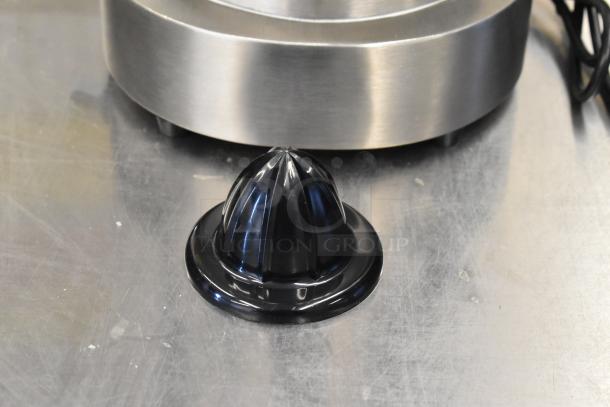 Brand new AvaMix CJ1400 stainless steel citrus juicer. Scratch and dent. 120V, 1 phase. Juicer cone and base shown.