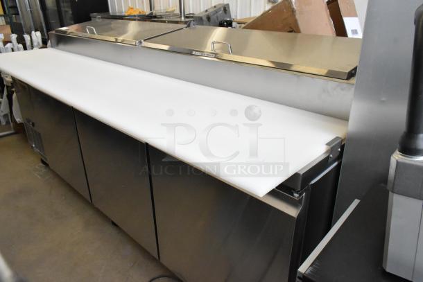 Brand new Avantco 178SSPPT3 stainless steel commercial pizza prep table with minor scratches and dents, 115V, 1 phase.