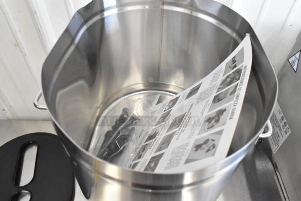 Brand new Bunn 34100.0002 TDO-4 4-gallon iced tea dispenser with brew-through lid, minor scratches, includes manual.