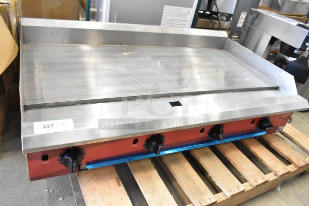 Brand new Avantco 177CAG48TG 48" natural gas griddle with thermostatic controls, 140,000 BTU, scratch and dent condition.