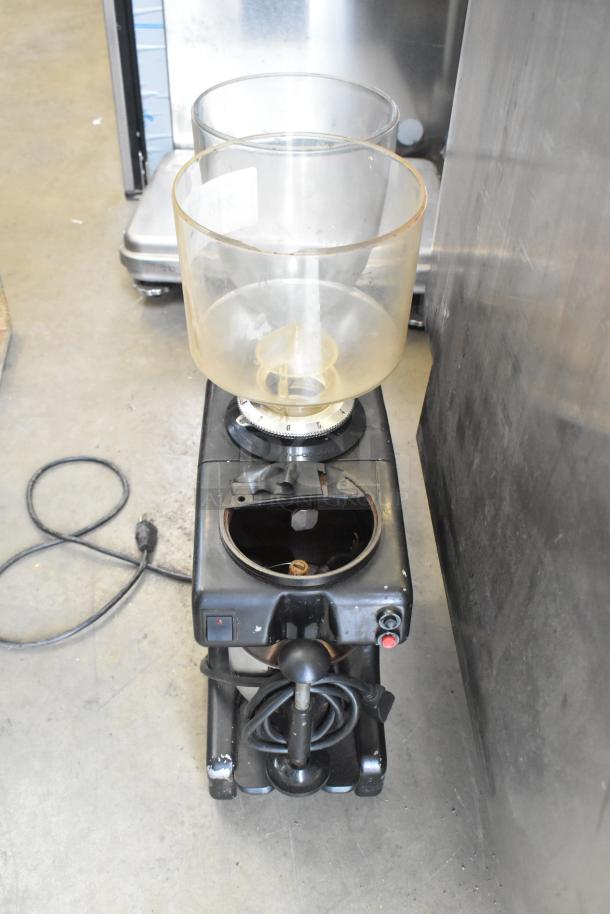 Metal countertop espresso bean grinder, no lid, 115 volts, 1 phase. Visible wear, includes power cord.
