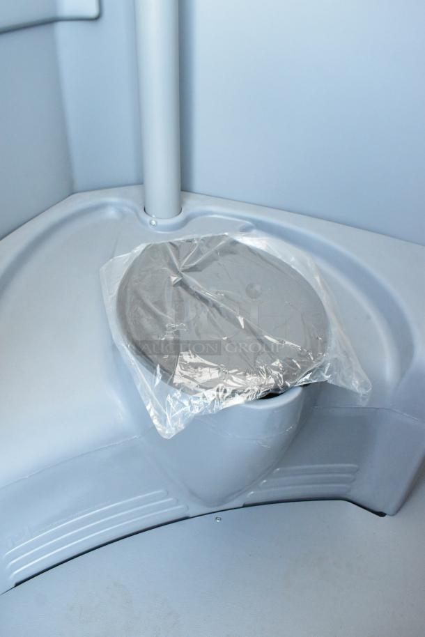 Brand new PolyJohn FS3-1005 Fleet Pewter Premium Portable Restroom, scratch and dent, pristine interior, packaging on seat.