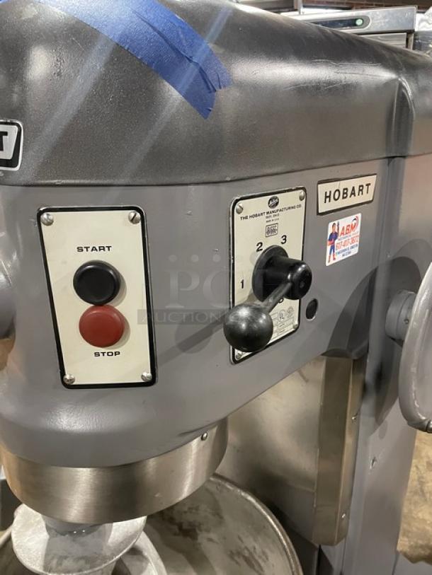 Hobart H600 60 Qt. Commercial Mixer with bowl and dough hook; 208V, 3 phase, start/stop buttons; model and serial number visible.