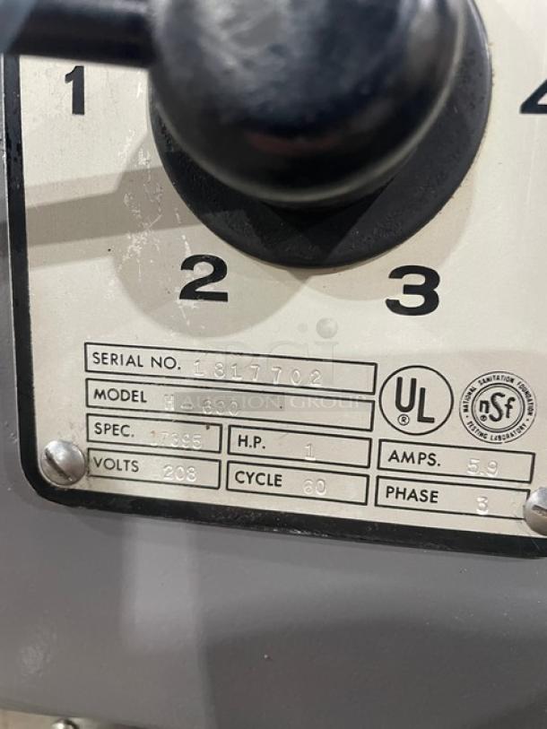 Hobart H-600 commercial mixer label showing serial 1817702, 208V, 3 phase, 1 HP. UL and NSF certified.