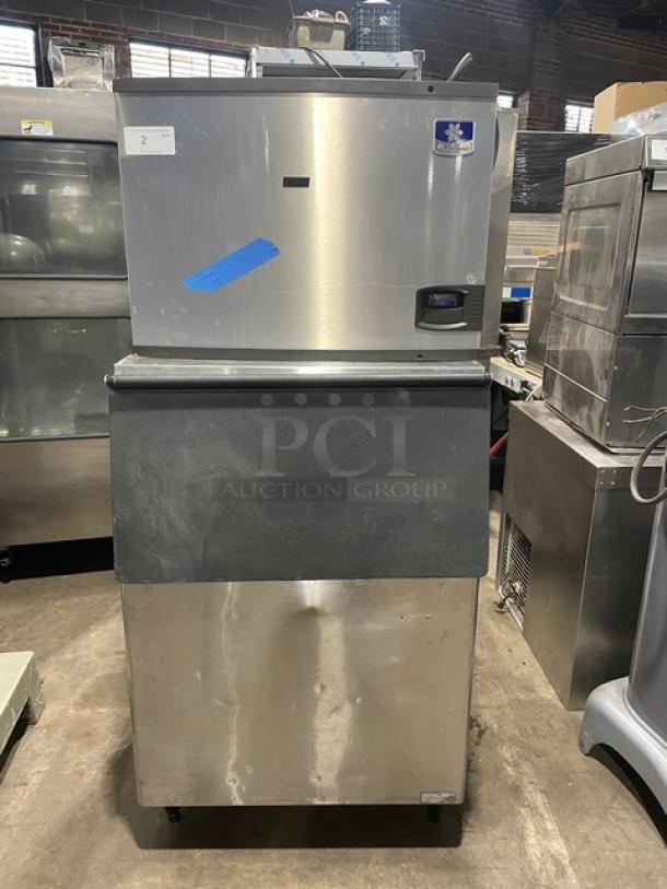 Manitowoc Indigo Series IY0454A161 ice machine with bin, stainless steel, air-cooled, Energy Star certified, on legs.