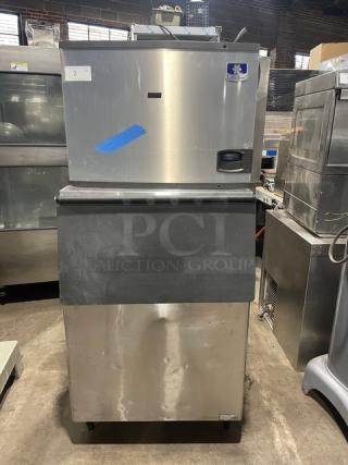 Manitowoc Indigo Series IY0454A161 ice machine with bin, stainless steel, air-cooled, Energy Star certified, on legs.