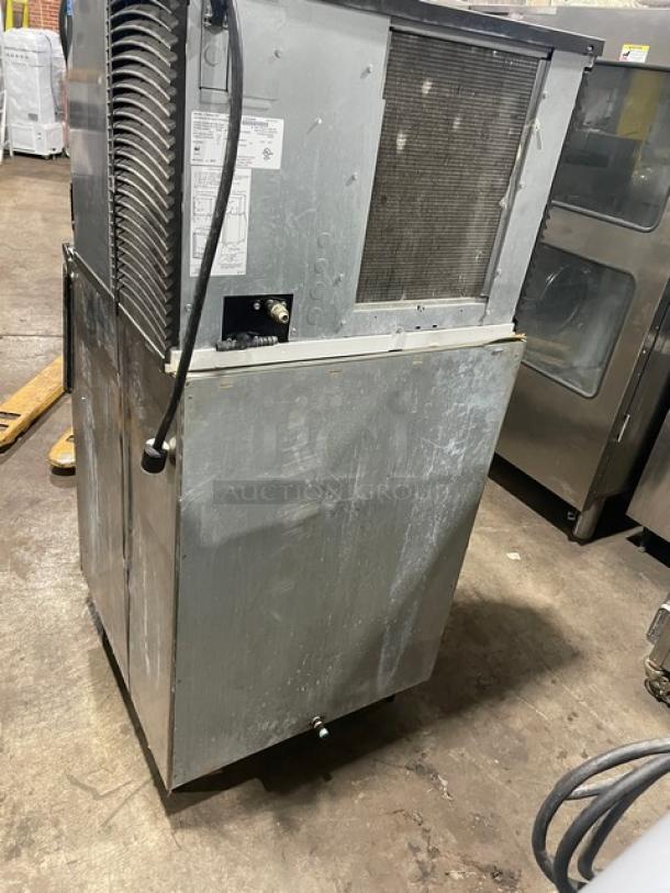 Manitowoc Indigo Series ice maker, model IY0454A161, stainless steel, electric, air-cooled, on legs, visible wear.