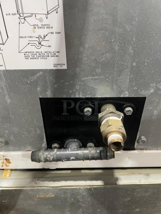 Manitowoc Indigo IY0454A-161 ice machine, stainless steel, Energy Star certified, on legs, connections and label visible.