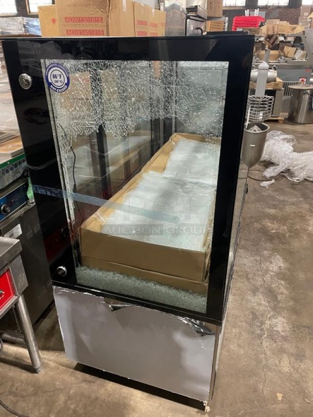 Omcan 60" stainless steel refrigerated bakery display case, model RSCN0471S. Scratch-n-dent condition with straight glass.