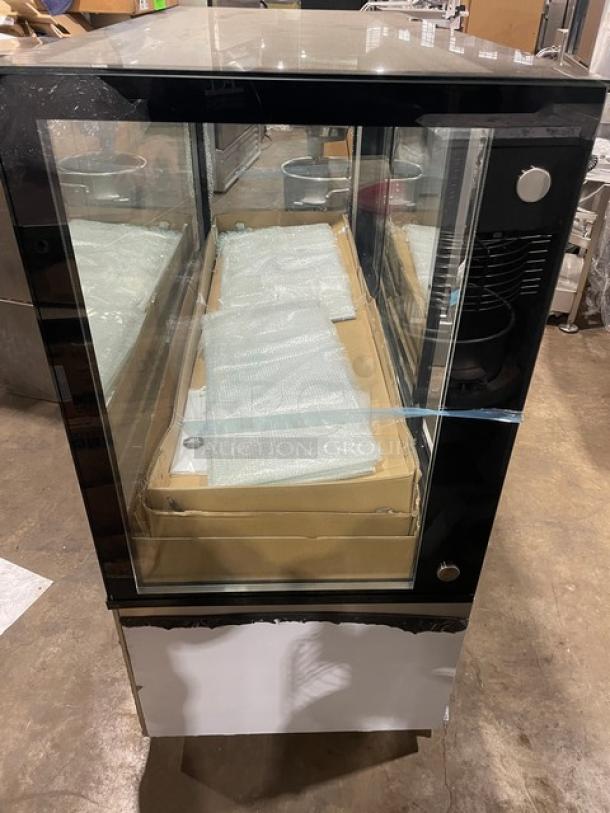 Omcan 60" stainless steel bakery display case, model RS-CN-0471-S, new scratch-n-dent, refrigerated, on casters.