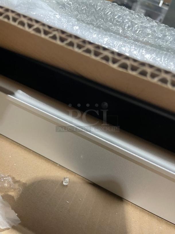 Omcan 60" stainless steel bakery display case, model RS-CN-0471-S, new with minor scratches, on casters for mobility.