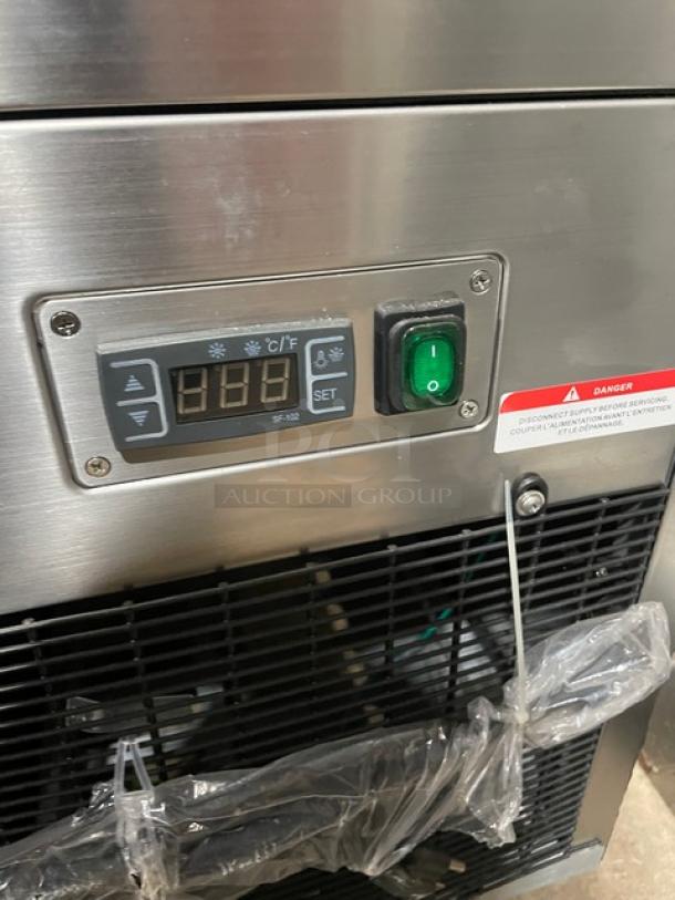 Omcan Refrigerated Bakery Display Case, Model RS-CN-0471-S, new condition, stainless steel, 60" glass, on casters, 110V, 1 phase, digital controls.