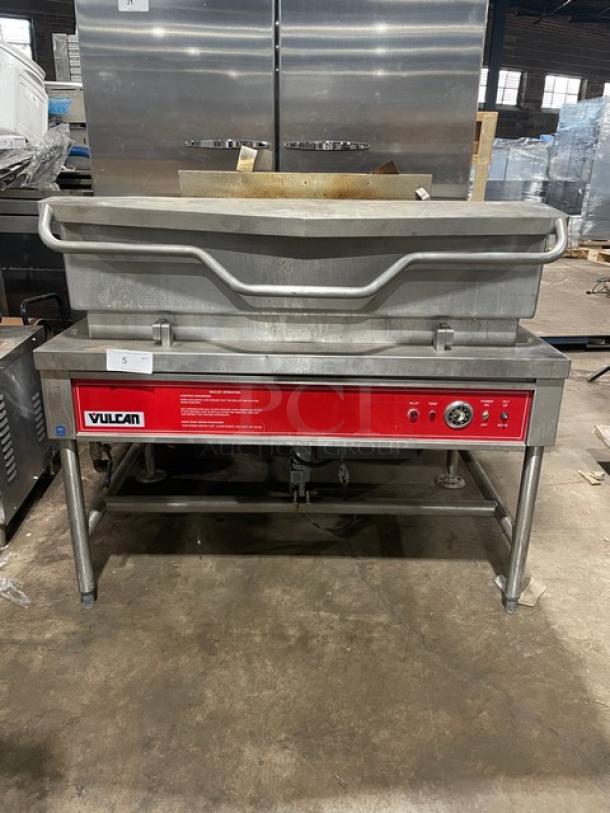 Vulcan stainless steel natural gas powered tilted braising pan, commercial ultra tilt skillet on sturdy legs, excellent condition.