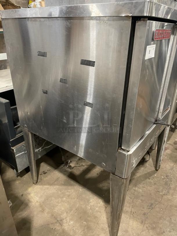 Blodgett commercial stainless steel natural gas convection oven, single stack with wired rack, on legs, used condition.