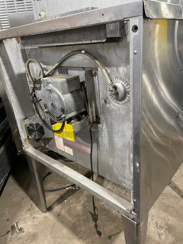 Blodgett commercial stainless steel natural gas convection oven, single stack, with wired rack, on legs, used condition.