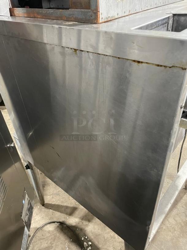 Blodgett stainless steel natural gas convection oven, single stack, wired rack included, mounted on legs, used condition.