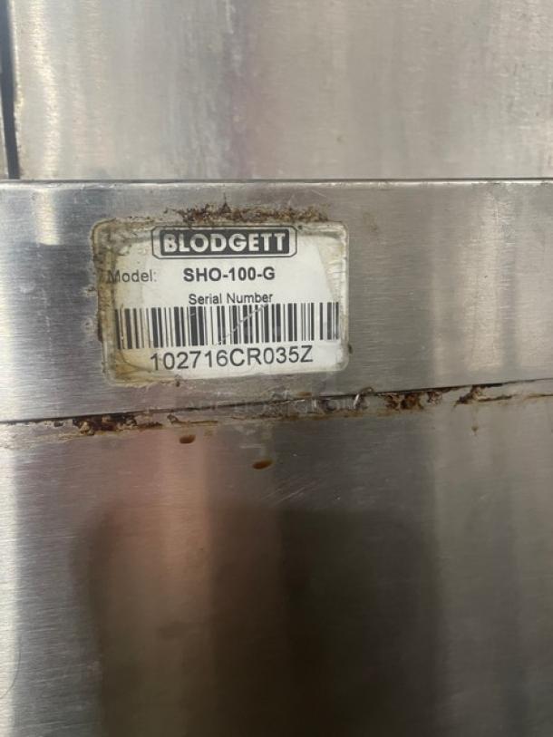 Blodgett SHO-100-G convection oven label showing model, serial number 102716CR035Z. Stainless steel with visible wear.